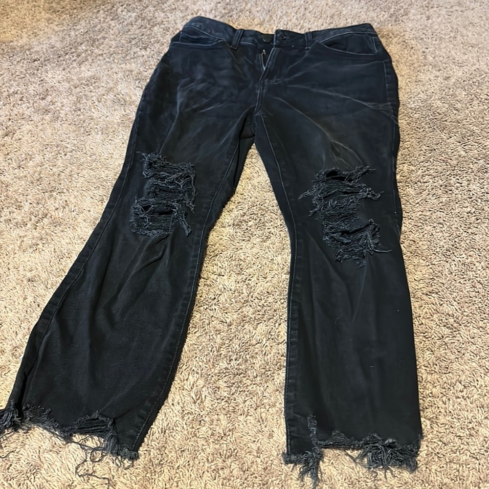 Distressed straight jeans